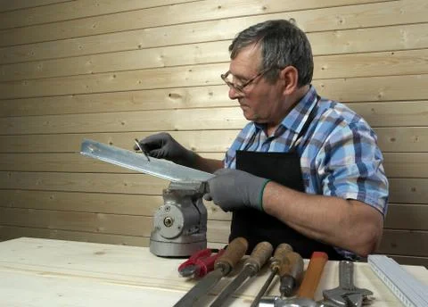 Senior carpenter working in his workshop Stock Photos
