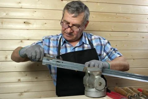 Senior carpenter working in his workshop Stock Photos