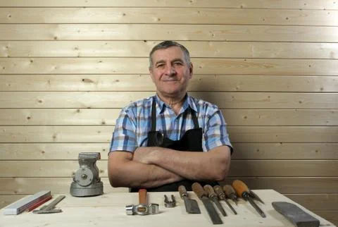 Senior carpenter working in his workshop Stock Photos