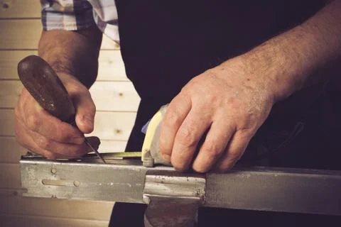 Senior carpenter working in his workshop Stock Photos