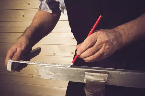 Senior carpenter working in his workshop Stock Photos