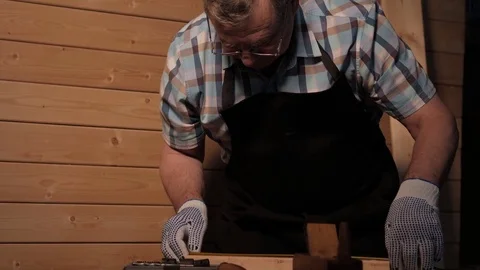 Senior carpenter working with ruler Stock Footage 77109263