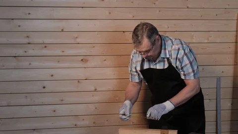 Senior carpenter working with ruler Stock Footage 77214057