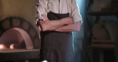 Senior caucasian bakery worker making bread. Portrait of successful mature small Vidéo 156298422