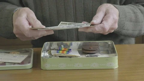 Senior caucasian man looking through a memory box Video stock 102297508
