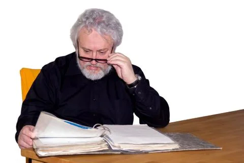 Senior is checking some papers Foto stock