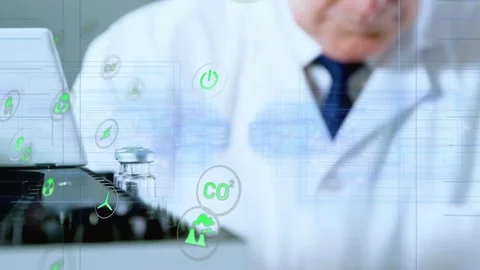 Senior chemist placing vial in analyzer, comparing vials for eco test with Stock Footage 333774413