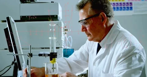Senior chemist using pipette on column, dripping amber liquid, logging data with Stock Footage 330577332