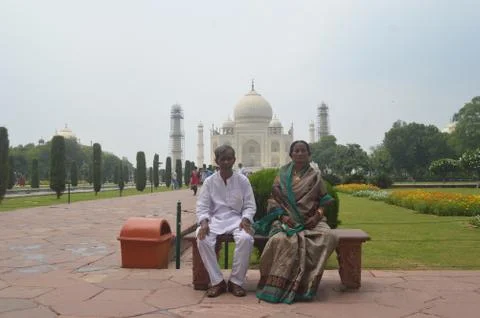 Senior citizen couple in front of beautiful Taj mahal of India,Agra 5th July Stock Photos