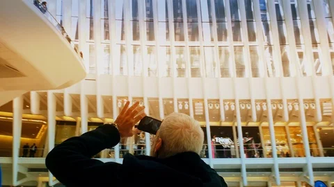 Senior Citizen taking picture at Oculus station World Trade Center 4K Stock Footage 89012967