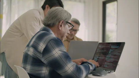 Senior Coding Technology Learning Collaboration Support Development. Stock Footage 308232731