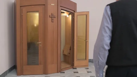 Senior in a confessional Stock Footage 89974218