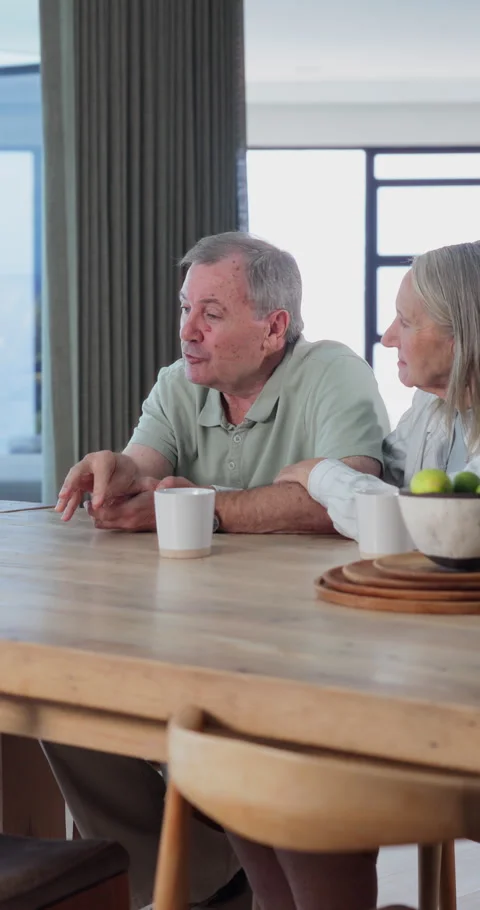 Senior, couple and discussion with advisor in retirement home for financial Stock-Footage 340888564