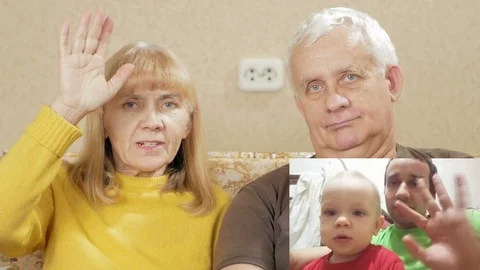 Senior couple communicates with the son and grandson on the internet. PIP: see Stock Footage 71248345
