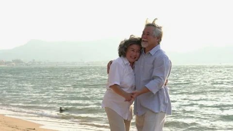 Senior couple dancing on the beach. Stock Footage 177969591