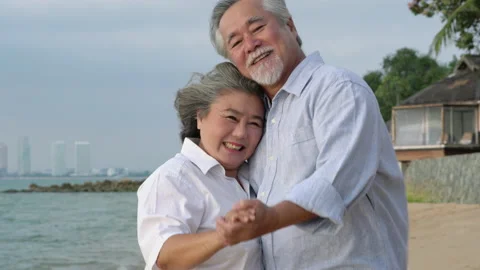 Senior couple dancing on the beach. Stock Footage 177970164