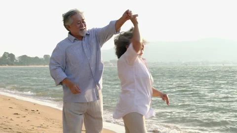Senior couple dancing on the beach. Stock Footage 177971282