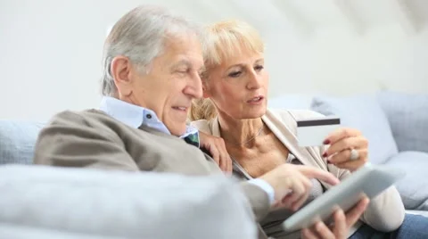 Senior couple e-shopping with digital tablet Stock-Footage 41421661