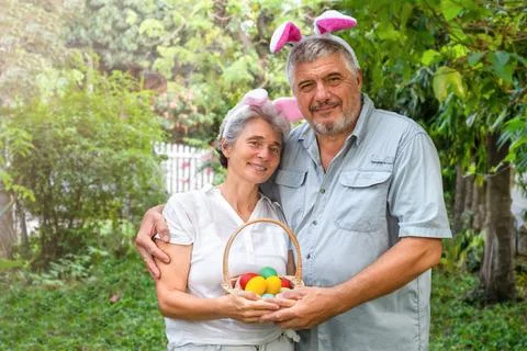 Senior couple with easter eggs Stock Photos