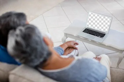 Senior couple holding hands while looking at laptop Stock Illustration