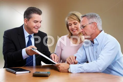 Senior couple with insurance agent. Stock Photos