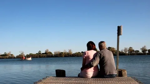 Senior couple on jetty Stock Footage 158019910