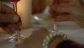Senior couple kissing after glass of wine, romantic anniversary date, closeup HD Footage