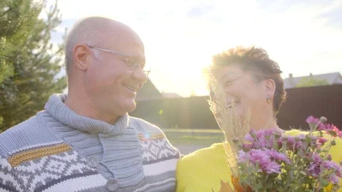 Senior couple is laughing at sunset Stock Footage 81108112