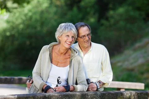 Senior couple looking away while hiking Stock Photos
