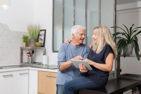 Senior couple looking at a tablet computer Foto stock