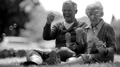 Senior couple making bubbles. Stock Footage 88404402