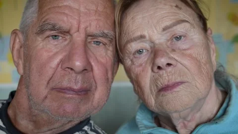 Senior couple posing showing calm facial expressions close up Stock Footage 288379465