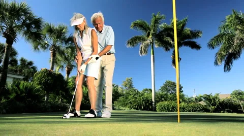 Senior Couple Practicing Golf   Stock Footage