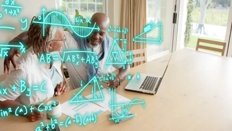 Senior couple sitting at table, man pointing at laptop and activating teal STEM Stock Footage 333210899