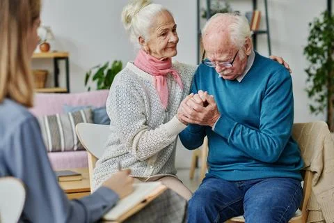 Senior couple solving problems with psychologist 写真素材