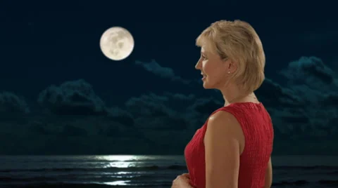Senior couple standing in moonlight Stock Footage 43678464
