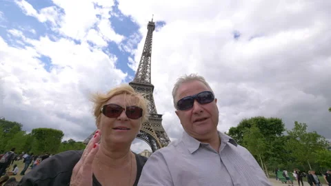 Senior couple taking selfie on Eiffel Tower in Paris in 4k slow motion 60fps Stock Footage 109424598