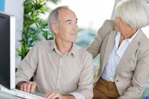 Senior couple using a computer Stock Photos