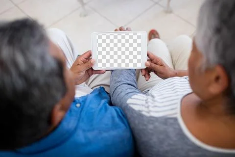 Senior couple using digital tablet at home Stock Illustration