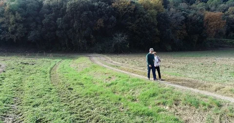 Senior couple walking on the mountain Stock Footage 101740309