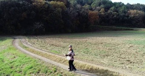 Senior couple walking on the mountain Stock Footage 101740312