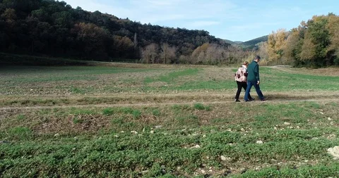 Senior couple walking on the mountain Stock Footage 101740361