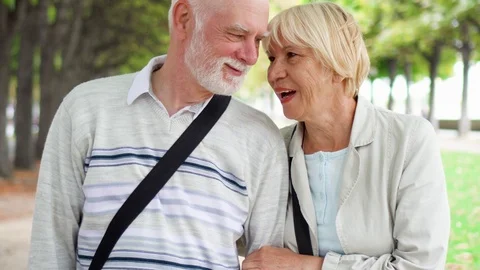 Senior couple walking in park. Active modern life after retirement. Family Stock Footage 81799009