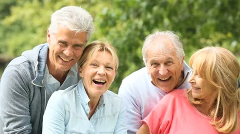 Senior couples having a good time in countryside Stock Footage 55160075