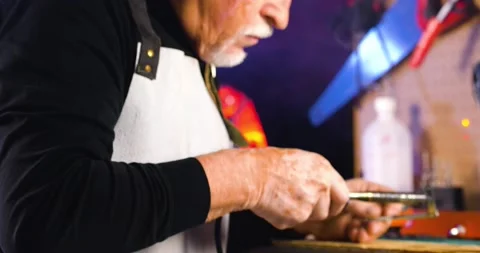 Senior craftsman working in his workshop. Stock Footage 130917406