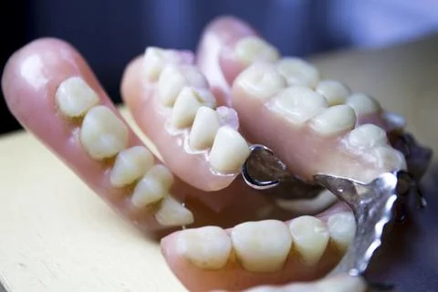 Senior denture on a table Stock Photos