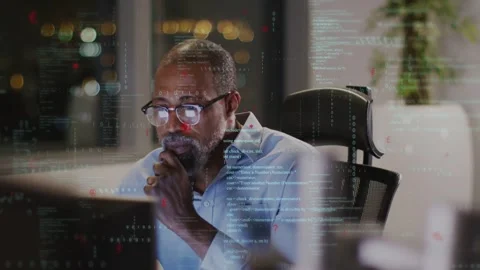 Senior dev leaning and studying code onscreen overlay updating hand moving Stock Footage 335282050