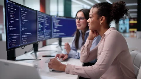 Senior Developer Helping Junior Developer To Solve Programming Code Problem Stock Footage 329682269