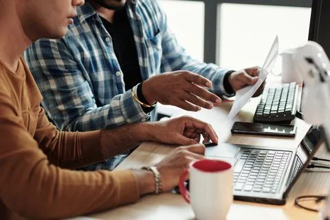 Senior Developers Discussing Documents Stock Photos