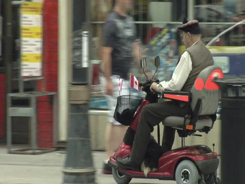 Senior with Disability on Scooter Stock Footage 6499423